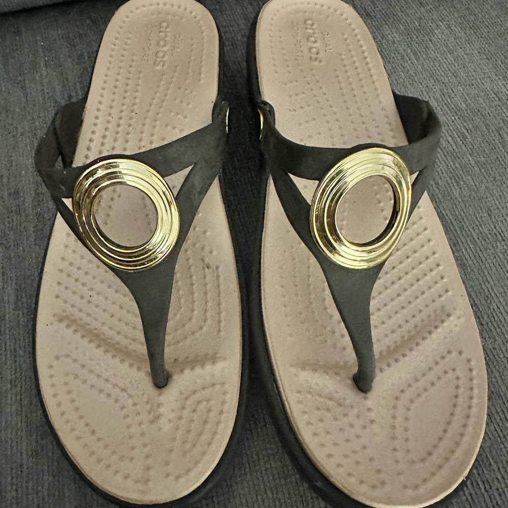 CROCS Gold and Black Sandals with Metallic Accent
